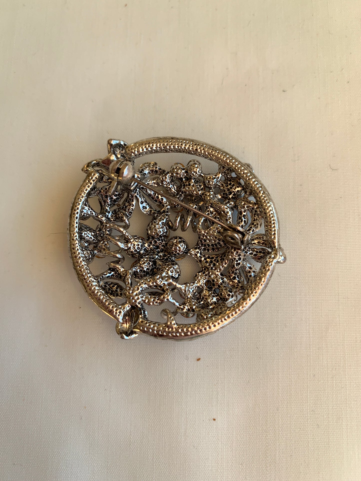 Silvertone Blue Rhinestoned Round Pin/Brooch, Rolled Safety Pin Closing, Textured, Elegant