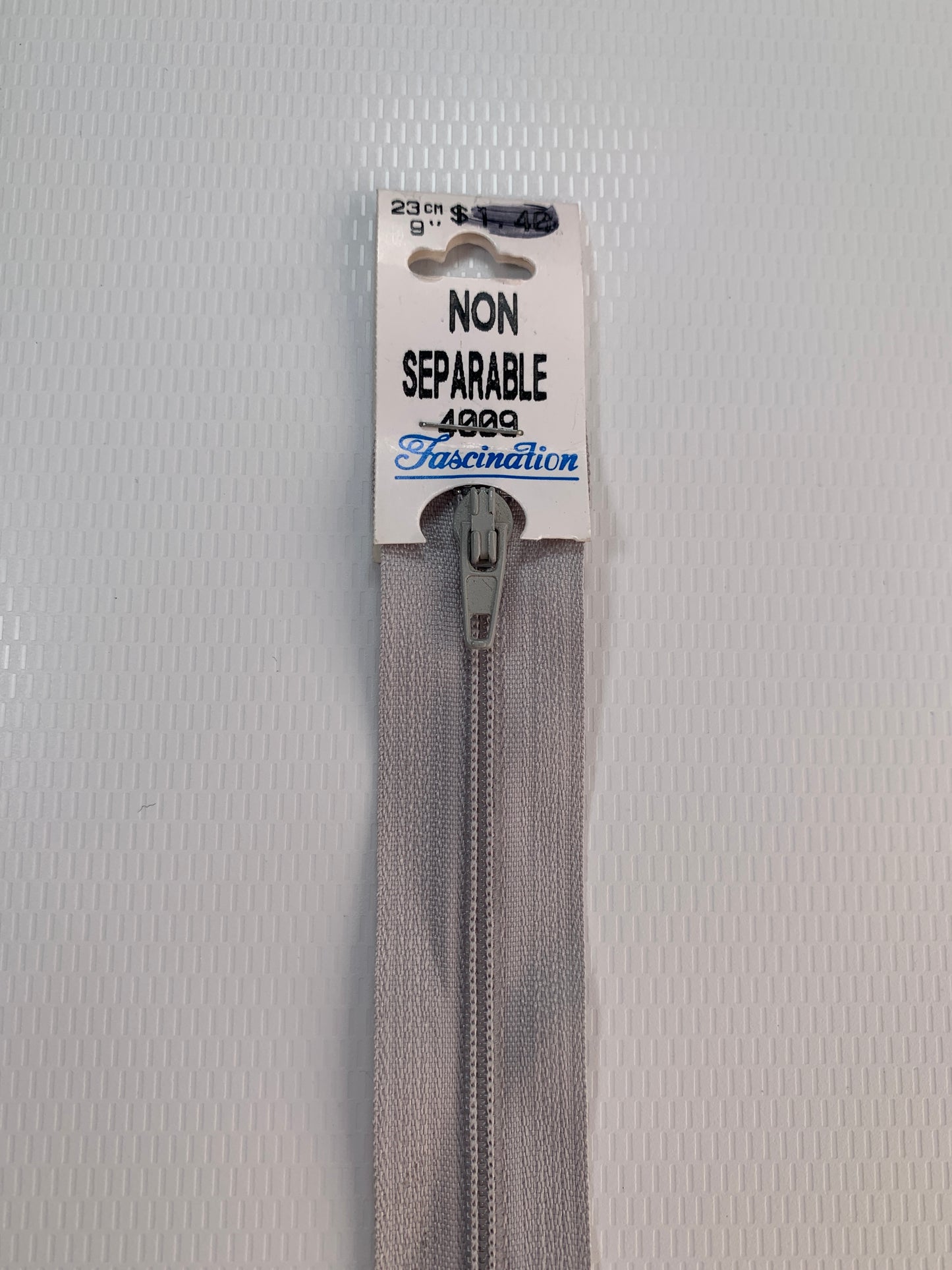 9 Inch Non-Separating Zipper, Light Gray, Molded Plastic, New