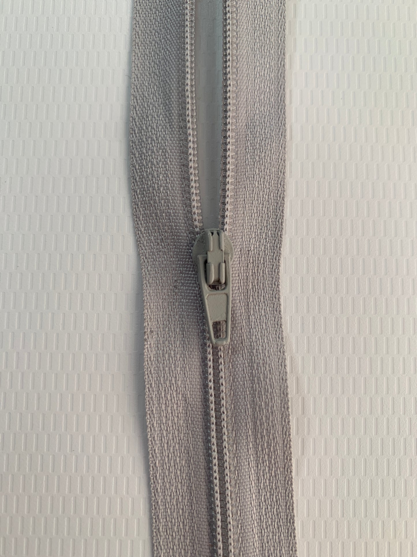 9 Inch Non-Separating Zipper, Light Gray, Molded Plastic, New