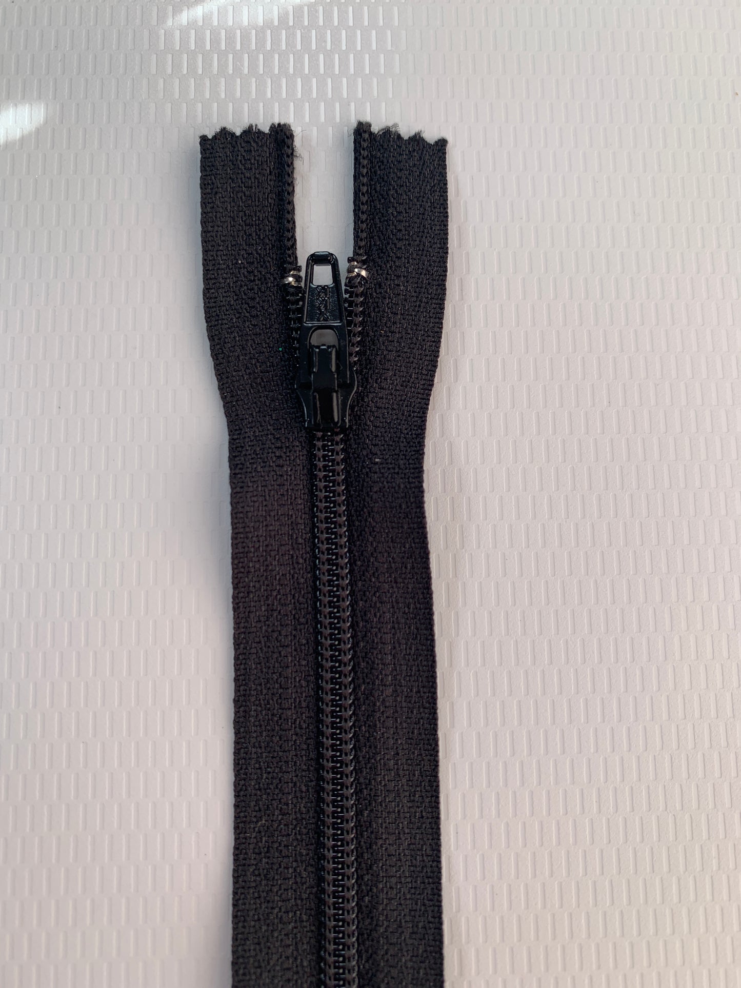 7 Inch Non-Separating Zipper, Black, Molded Plastic, New