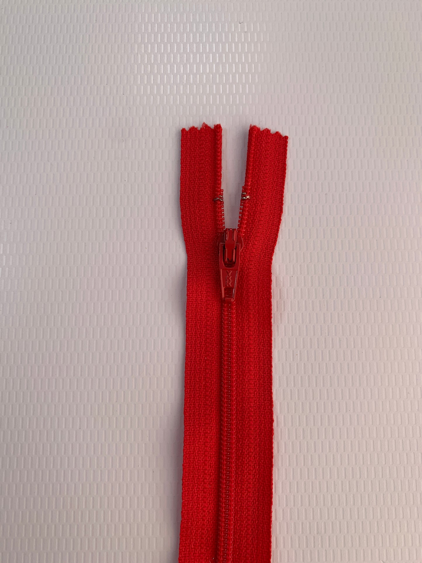 7 Inch Non-Separating Zipper, Orange Red, Molded Plastic, New