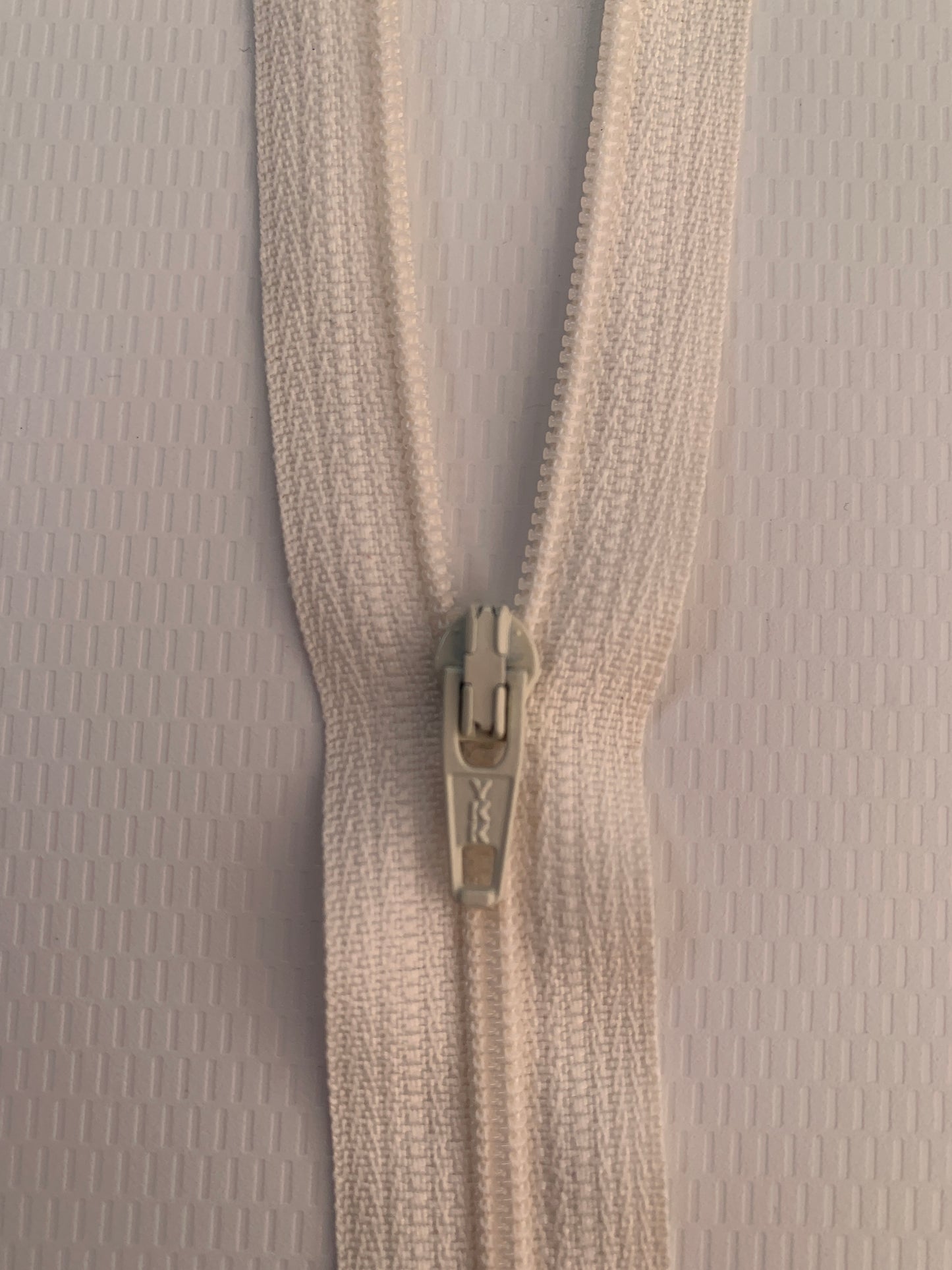 7 Inch Non-Separating Zipper, Cream Color, Molded Plastic, New
