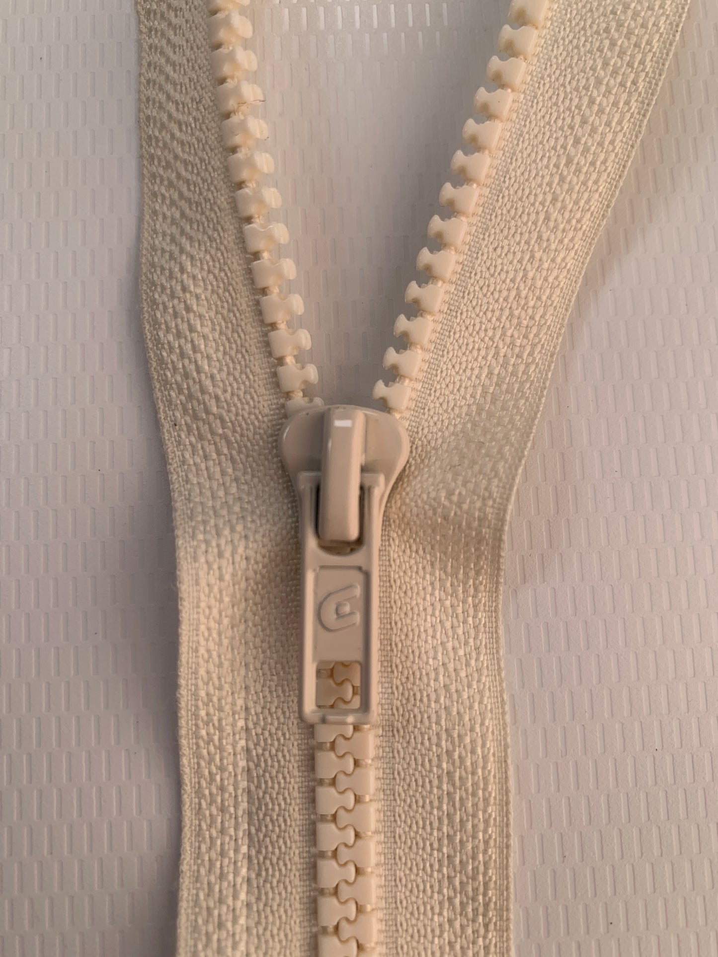 7 Inch Non-Separating Zipper, Cream Color, Molded Plastic, New