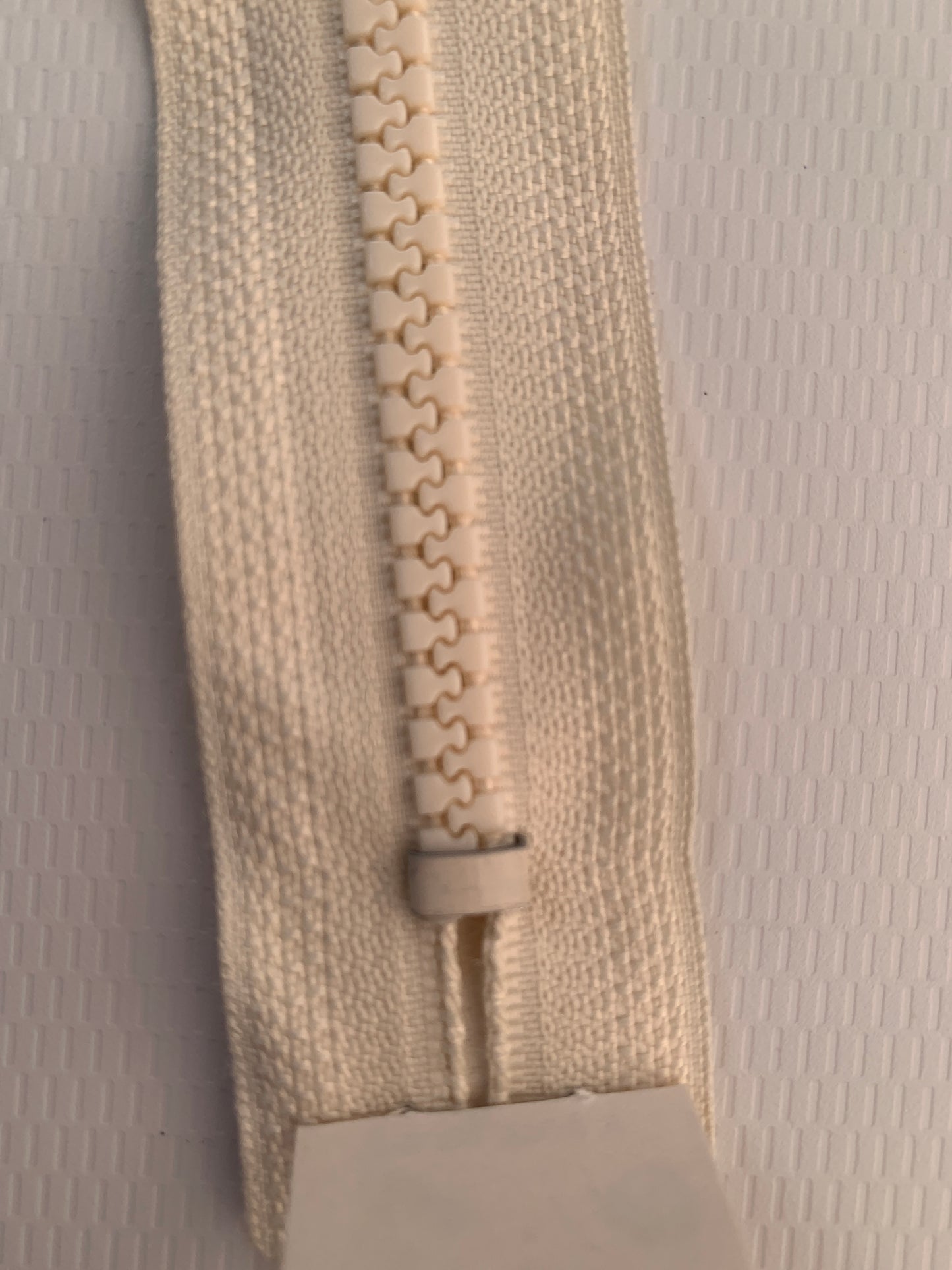 7 Inch Non-Separating Zipper, Cream Color, Molded Plastic, New