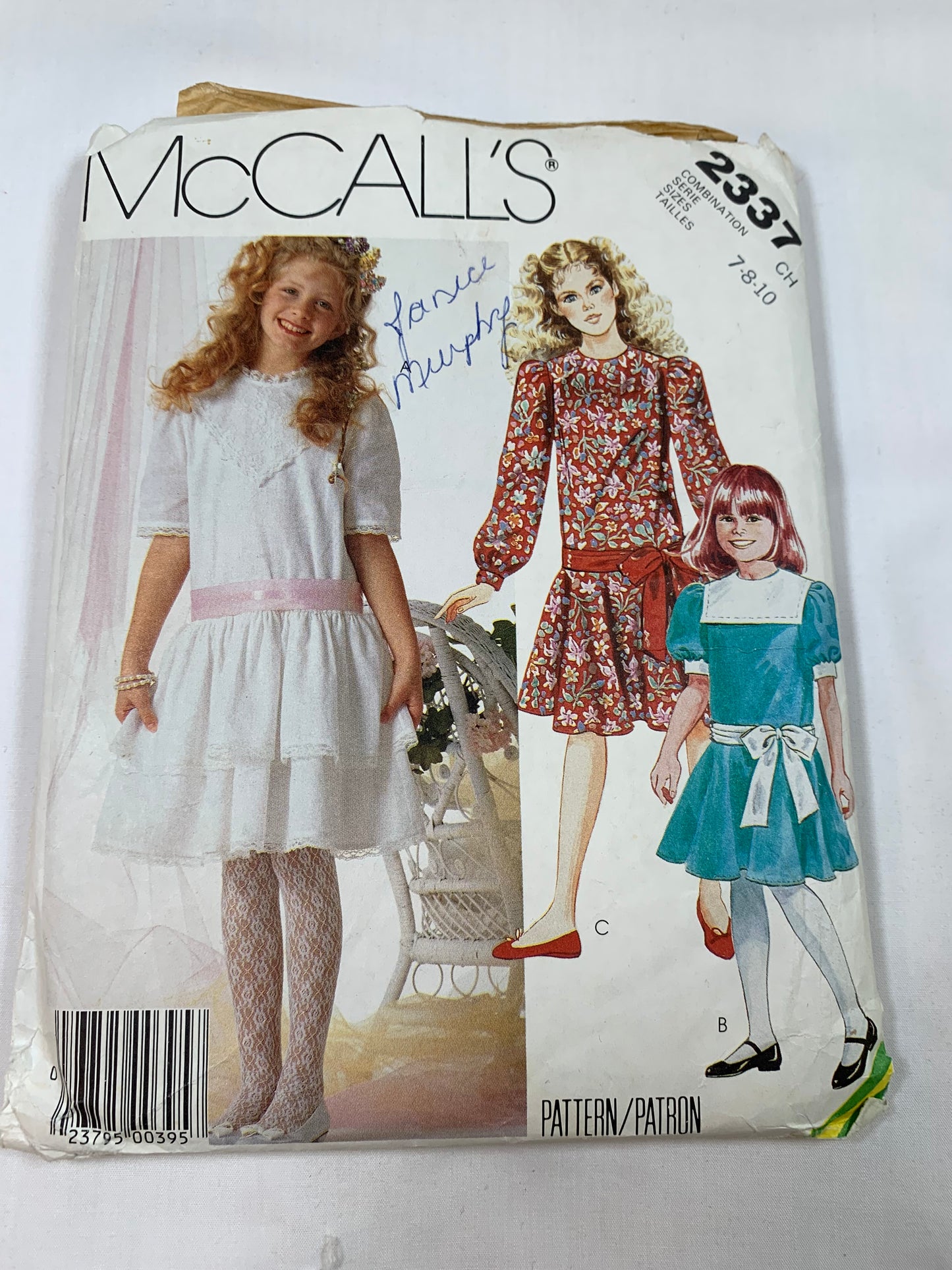 McCall's Sewing Pattern 2337 Girls' Dresses,Sash, Low Waist, Long/Short Sleeves, Zipper Back, Flared Skirt, Ruffles, Size 7-10, Cut, Vintage 1986