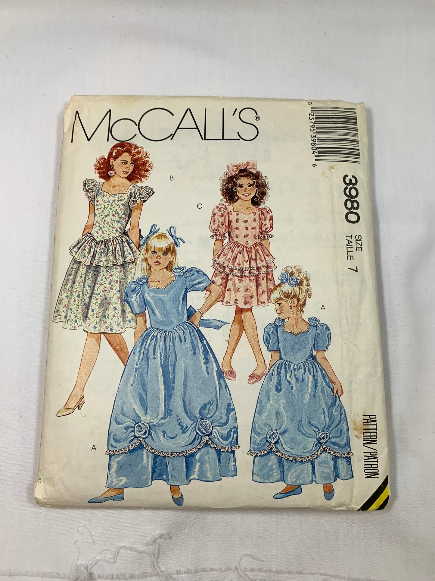 McCall's Sewing Pattern 3980 Girls' Dresses, Gown, Zipper Back, Short Puff Sleeves, Two Lengths, Tie Belt, Full Tiered Skirts, Size 7, Cut, Vintage 1988