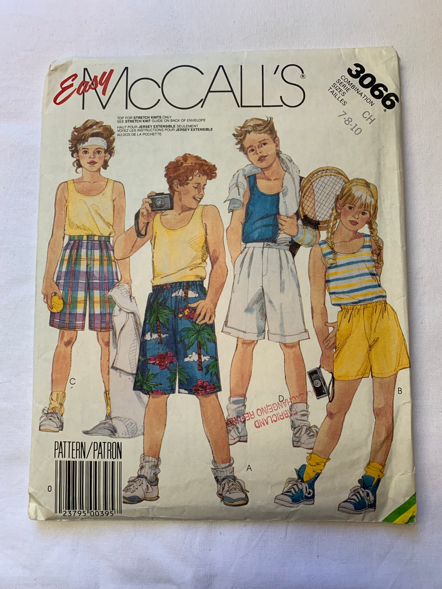 McCall's Sewing Pattern 3066 Boys' and Girls' Tops, Shorts, Stretch Knits, Pullover, Sleeveless, Two Lengths, Elastic Waist, Pull-On, Pockets, Size 7-8, Cut, Vintage 1987