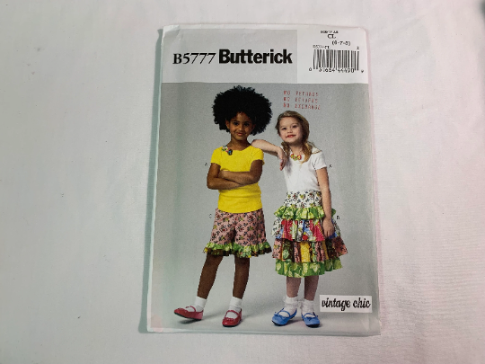 Butterick Sewing Pattern B5777 Girls' Top, Skirt, Shorts, Pullover, Elastic Waist, Pull-on, Short Sleeves, Ruffles, Size 6-8, Uncut, 2012