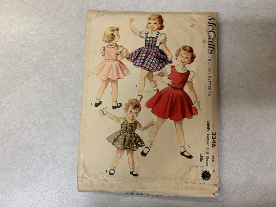 McCall's Sewing Patterns 3346 Girl's Jumper Dress, Blouse, Short Sleeves, Flared Skirt, Back Button, Shoulder Straps, Child's, Cut, Vintage 1955