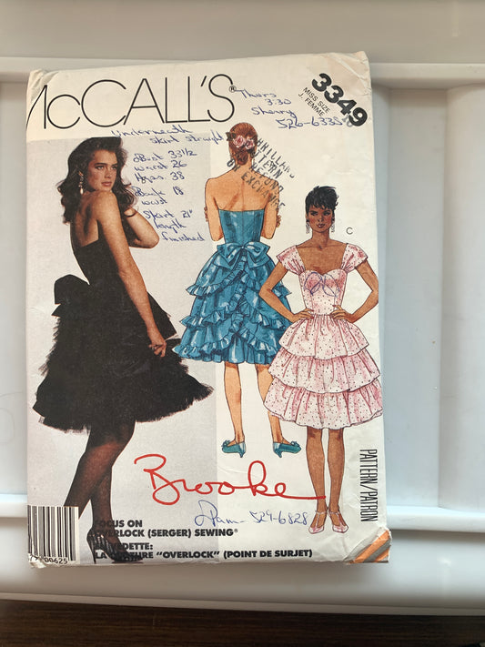 McCall's Brooke Shields Sewing Pattern 3349 Misses Dress Zipper Back, Tiered Skirt, Tied Ends, Size 10, Uncut, Vintage 1987