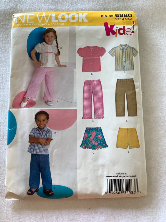 Simplicity New Look Sewing Pattern 6880 Girls'/Boys' Top, Pants, Shorts, Skirt, Pants, Short Sleeves, Elastic Waist, Size 1/2-4, Uncut, Vintage 2009