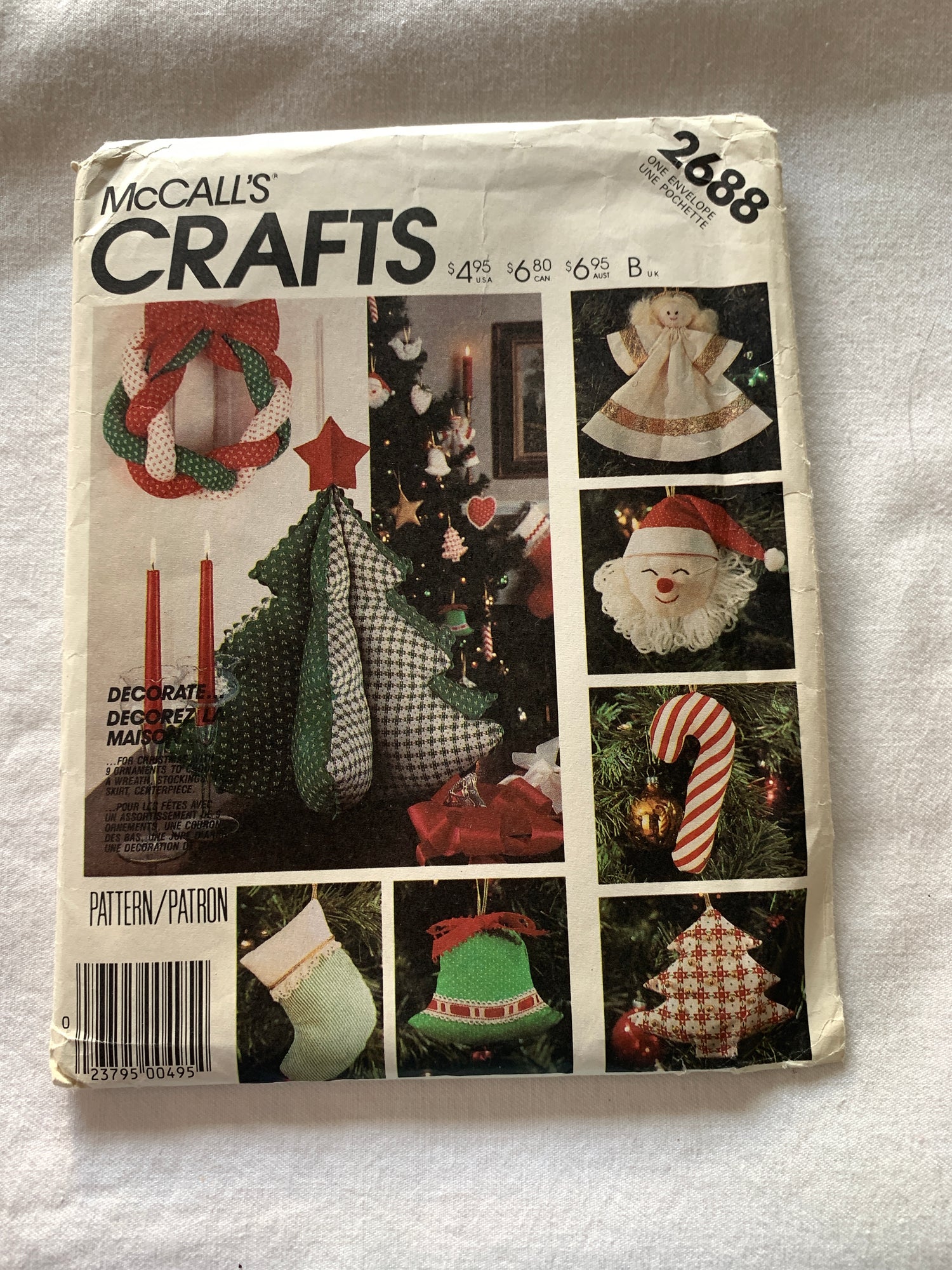 McCall's Sewing Pattern 2688 Crafts, Christmas Ornaments, Stockings, Wreath, Angel, Santa, Candy Cane, Bell, Tree,  Uncut, Vintage 1986
