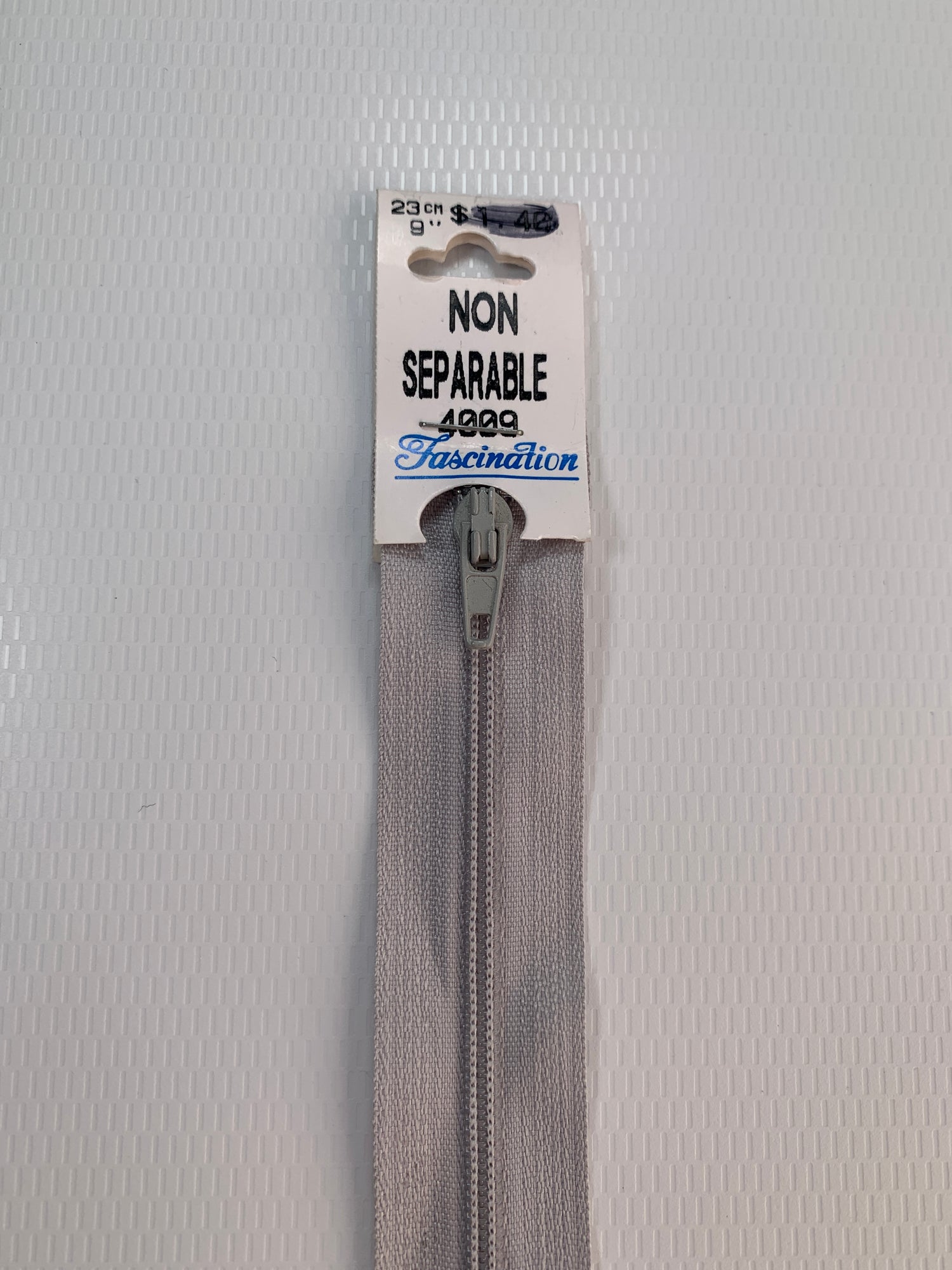 9 Inch Non-Separating Zipper, Light Gray, Molded Plastic, New