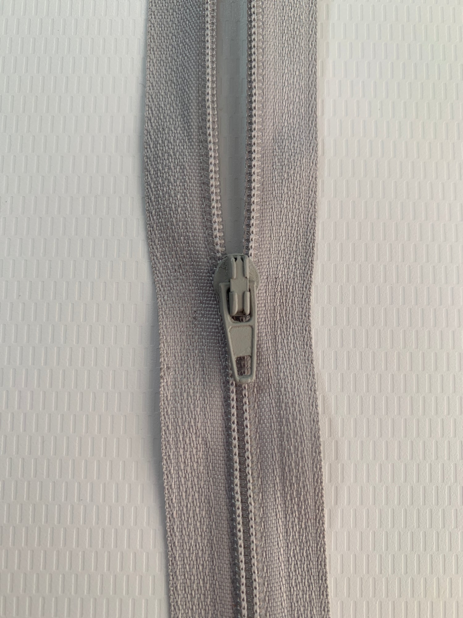 9 Inch Non-Separating Zipper, Light Gray, Molded Plastic, New