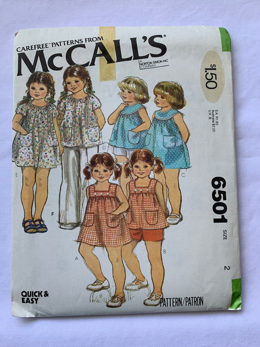 McCall's Sewing Pattern 6501 Toddlers' Dresses, Tops, Pullover, Pockets, Button Back, Short Raglan Sleeves, Sleeveless, Size 2, Uncut, Vintage 1979