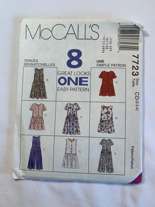 McCall's Sewing Pattern 7723 Girls'/Children's Dress, Jumpsuit, Rompers, Pockets, Loose Fitting, Short Sleeves, Sleeveless, Two Lengths, Size 2-4, Uncut, Vintage 1996