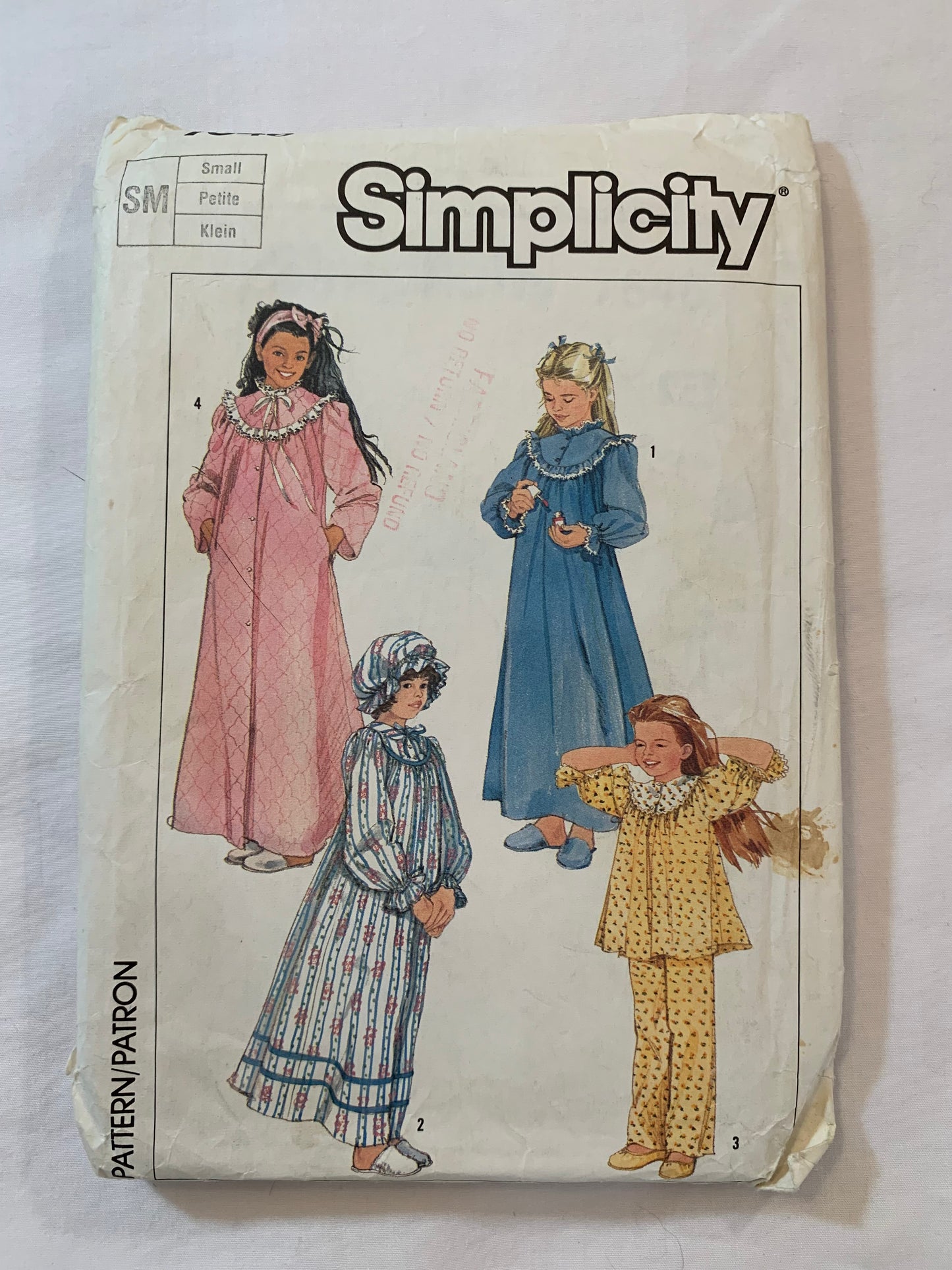 Simplicity Sewing Pattern 7646 Girls' Sleepwear, Housecoat, Hat, Pajamas, Robe, Top, Pants, Long Sleeves, Pockets, Button Front, Ruffle, Size Small, Uncut, Vintage 1986 Media 1 of 2