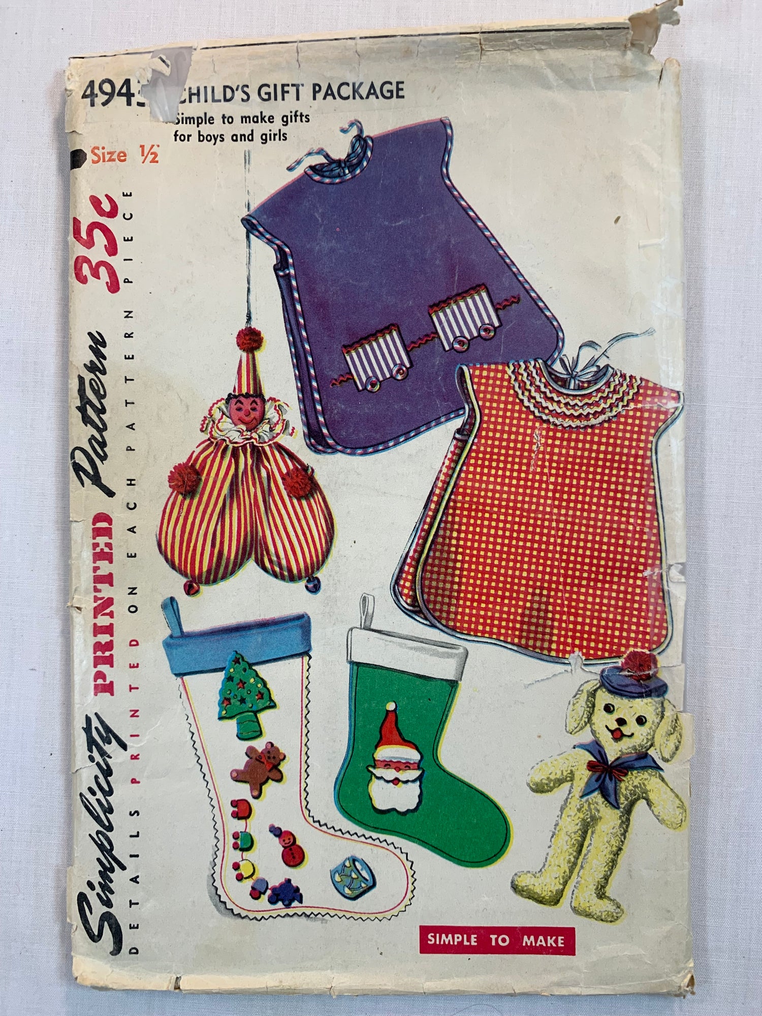Simplicity Sewing Pattern 4943 Child's Aprons, Christmas Stockings, Bean Bag Clown/Puppy Stuffie, Size 1/2, Uncut, Vintage 1950