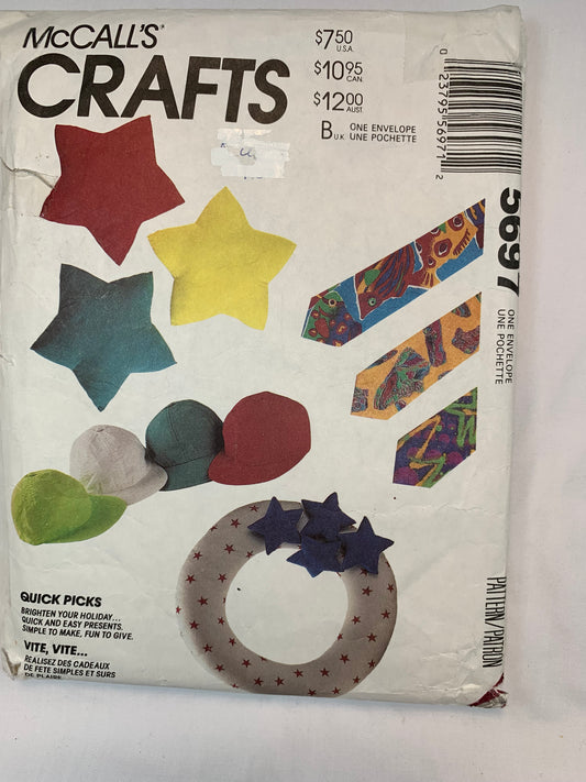 McCall's 5697 Home Decor Star Pillow, Apron, Necktie, Sachets, Log Carrier, Pet Pillow, Wreath, Oven Mitt, Baseball Cap, Cut, Vintage 1991