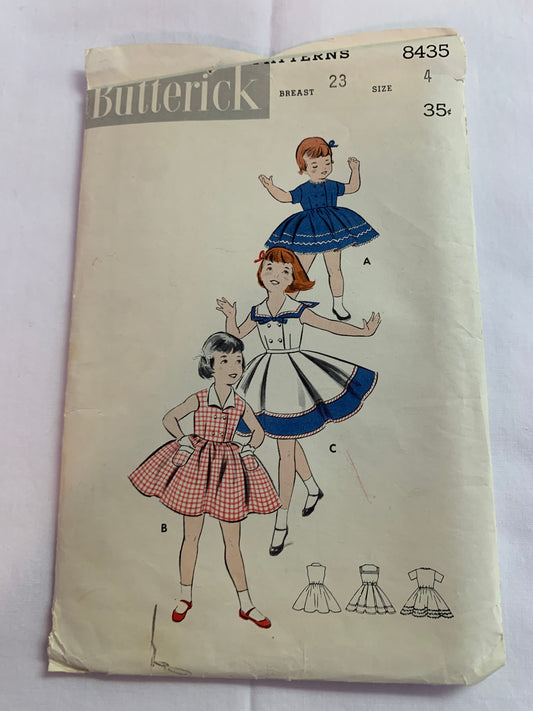 Butterick Sewing Pattern 8435 Girls' Dress, Full Skirt, Double Breast, Button Back, Short Sleeves,Sleeveless, Above Knee Length, Size 4, Cut, Vintage 1950