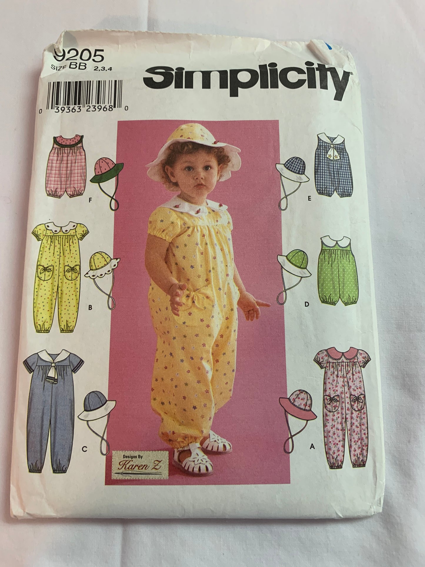 Simplicity Sewing Pattern 9205 Toddlers Romper, Hat, Sleeveless, Short Sleeves, 7 Variations, Pockets, Collar, Zipper Back, Size 2-4, Uncut, 2000