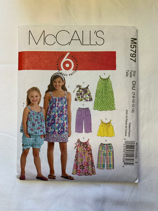 McCall's Sewing Pattern M5797 Girls' Tops, Dresses, Shorts, Pants, Elastic Waist, Pockets, Capris, Slit, Size 7-10, Cut, 2009