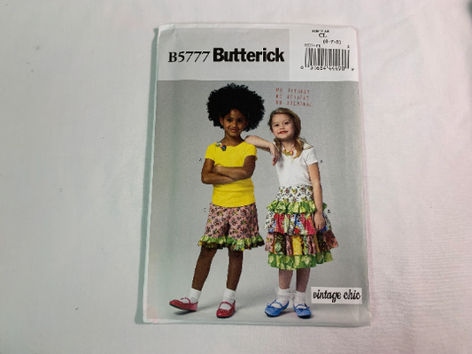 Butterick Sewing Pattern B5777 Girls' Top, Skirt, Shorts, Pullover, Elastic Waist, Pull-on, Short Sleeves, Ruffles, Size 6-8, Uncut, 2012