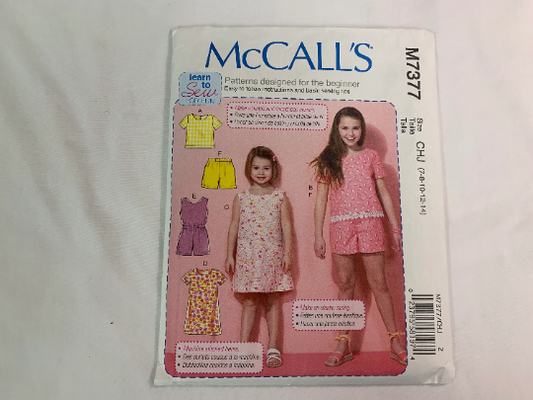 McCall's Sewing Pattern M7377 Girls' Dress, Top, Romper, Shorts, Pullover, Pockets, Short Sleeves, Sleeveless, Pull-On, Size 7-10, Cut, 2016